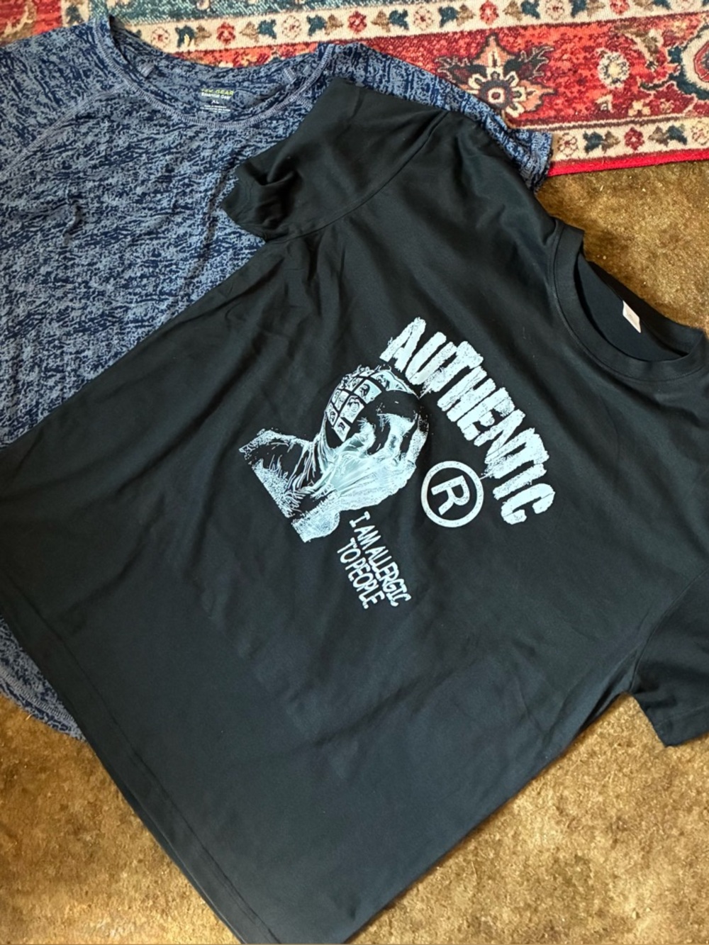 New without tags and preowned bundle of two black T-shirts both size XL women’s